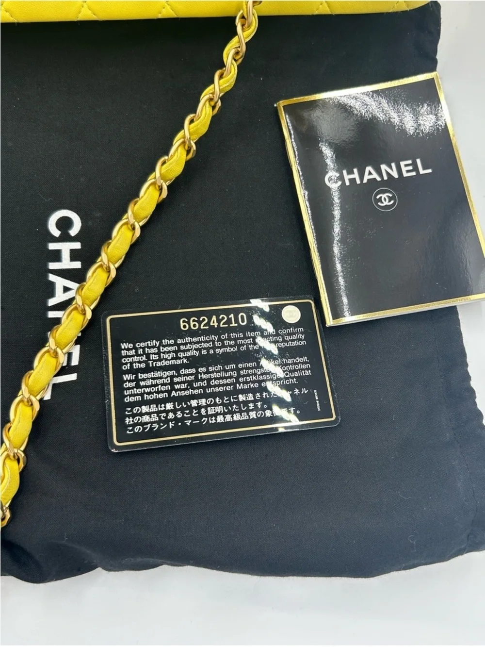 CHANEL CLASSIC QUILTED double flap bag . Yellow with gold hardware .
